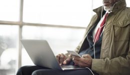 Businessman Using Laptop Mobile Sitting Concept